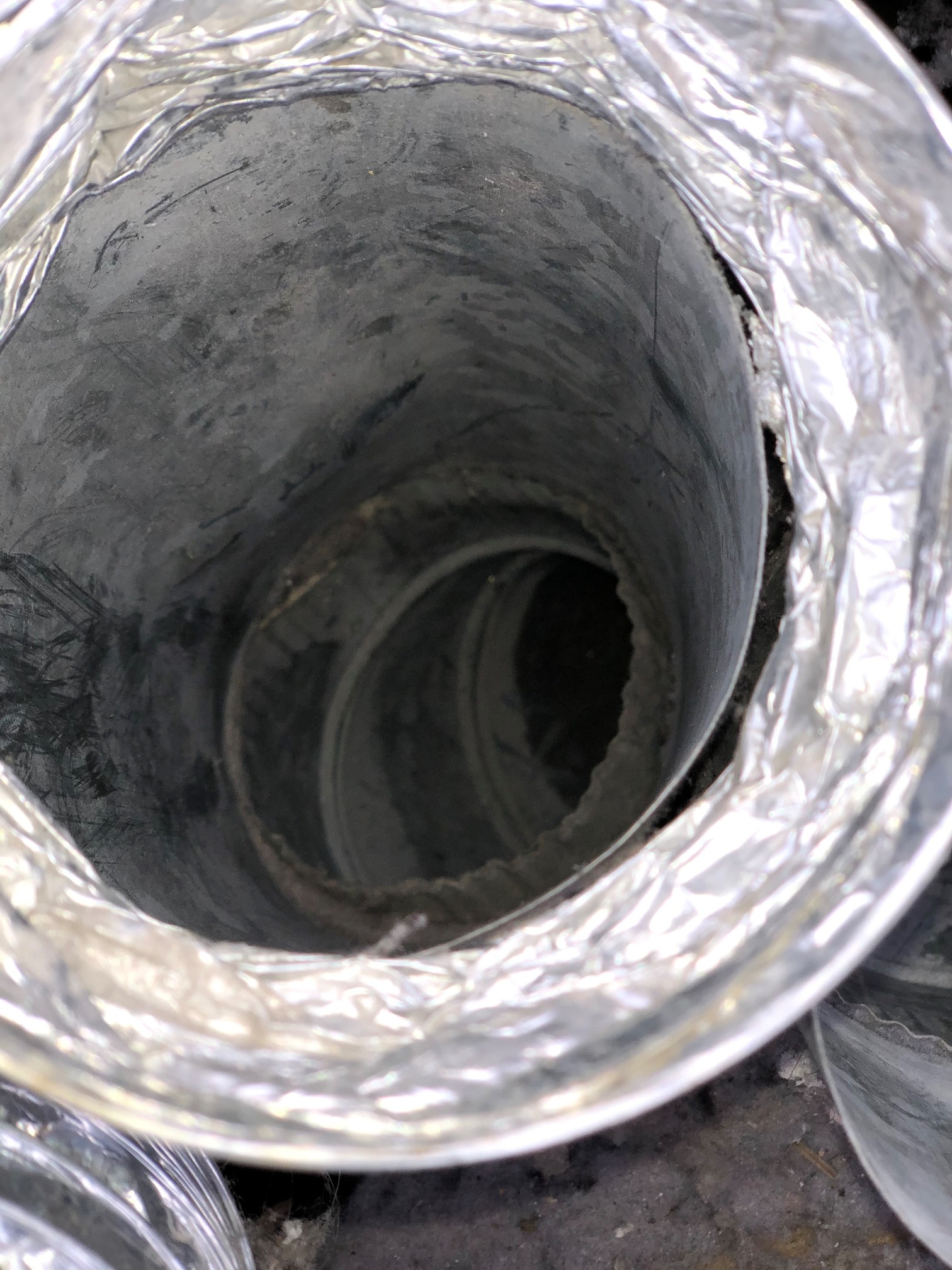 Picture showing a cleaned dryer duct with no lint inside